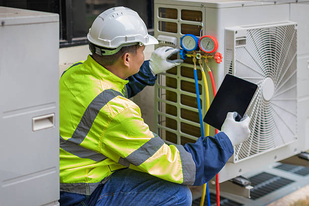 Professional Heat Pump Repair technician working in Hope Hull, AL